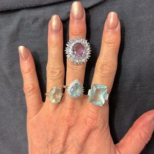 4 silver costume jewelry rings